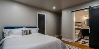 Completely remodeled like new Gingerbread midtown cottage with gleaming hardwoods, converted from a 3/1 to a 3/2. Gallery 32