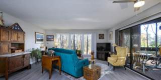 **Light-Filled Condo with Designer Finishes ✨ | Screened Porch Gallery 17