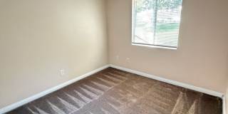 2BR/1BA Lakeside ground floor condo with 1 car detached garage, 1 uncovered parking space & community pool. Gallery 9