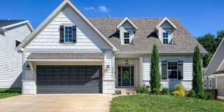 {4620} James Engle Custom Home built in 2019 + Main Floor Primary Bedroom + Finished Basement with Kitchenette +Fenced backyard with Covered Patio Gallery 1