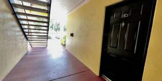 MOVE IN NOW!! Gated community Miriada! 1st floor 1X1.5 bath condo near pool area!!! Laminate wood flooring in living area and carpet in bedroom! Has washer & dryer! Gas stove & water heater! Gallery 4