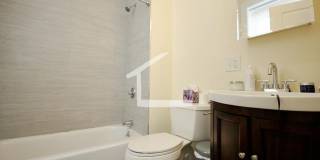 Nicely renovated Townhouse in a prime location near the Green Line with parking included! Gallery 8