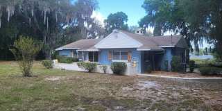 Little Lake Weir Waterfront FENCED 3BR/2BA on 6 Acres with Horse Barn, Private Boat Ramp & Dock Gallery 1