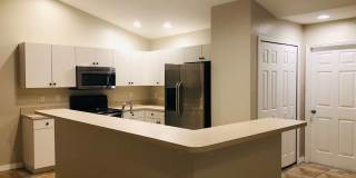 Experience this Cape Coral 3 bedroom 2 bath duplex with 1 car garage and screened in lanai. Gallery 8