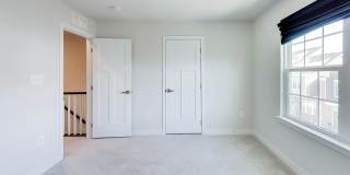 Welcome to this beautifully designed 3 level townhome in Westphalia Town Center Community! Gallery 22