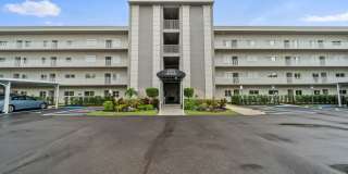 first-floor unit featuring a 2 bedroom, 2 bath fully furnished Gallery 1