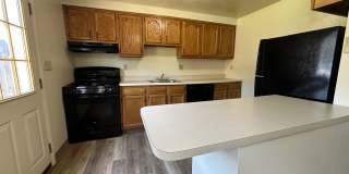 Wonderful Two Bedroom Townhouse in Perfect Plum Location! Private Patio, Garage  More! Call Today! Gallery 1