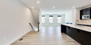Welcome to this beautifully designed 3 level townhome in Westphalia Town Center Community! Gallery 5
