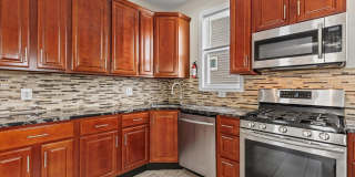 6BR / 5BA Single-Family Home | 2,663 Sq Ft | Private Driveway | Deck | $4,200/mo Spacious 6-bedroom, 5 full bathroom single-family home offering over 2,600 sq ft of living space in a convenient Baltimore location with excellent access to major commut Gallery 17