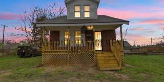 This beautifully updated 4-bedroom, 2-bath single-family home is ready for move-in! Gallery 1