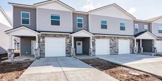 Darling 3 Bed 2.5 bath townhome in Sugar City, ID - with monitored Home Security System included in rent price. Gallery 1