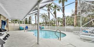 Gorgeous 4 bedroom pool house for rent w/ deeded beach access + pool & yard service included in the rent! Gallery 51
