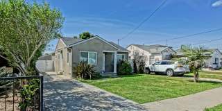 REMODELED, CHARMING & AIRY 3BR2BA HOME W/ OFFICE ON A LARGE LOT W/ NICELY LANDSCAPED FRONT YARD, LARGE FENCED REAR YARD W/ DECK & LARGE 3-CAR DRIVEWAY NEXT TO SCHOOL, PARK, SHOPPING, FREEWAY ACCESS & 10 MINS TO BEACH! Gallery 1