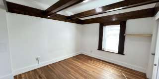 Stylish 2-Bedroom Unit Featuring Decorative Fireplace Gallery 9