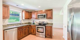 Spacious 3 bedroom home in desirable SW Durham! Super dog friendly with large fenced yard! Gallery 33