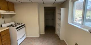 Great 2 bed 2 bath with bonus attic space house located steps from shopping. Gallery 11