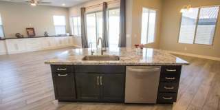 Gorgeous 4 Bed + den Single Level Home in gated community in North Peoria with RV Gate / BBQ!! Gallery 11