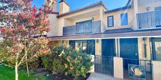 Gated 2-Bedroom Home with 2 En-Suite Bathrooms, 2 Car Garage & Private Balcony Gallery 1