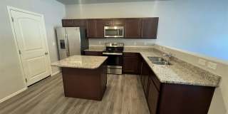 Townhome w/ 2 car garage, A/C-Newer, Low Maintance, & Conviniently Located Gallery 6