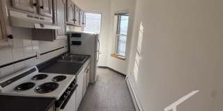 $2,400 Brighton 1-Bedroom Near Cleveland Circle | Heat & Hot Water Included | Available Now Gallery 1