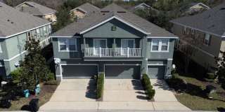Beautiful second-floor, 2-bedroom, 2-bath condo with peaceful lake views and an attached 1-car garage Gallery 1