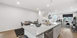 Welcome to this like new fully furnished home located in The Village at Courthouse Commons in Spotsylvania. Gallery 14