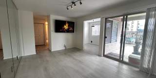 Updated 2-Bedroom Condo with Water Views, 2 Parking Spaces & Poolside Location Gallery 1