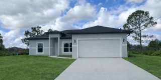 MOVE IN READY  BRAND NEW! Spacious 4 BD/ 2BA/ 2 Car Garage in Lehigh Acres Gallery 1