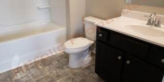 Beautiful Luxury 3 Story 3 Bedroom Townhome with 1st Floor Guest Suite, Attached 2 Car Garage, Community Pool and Fitness in Villages of Apex! Available Aug 7th! Gallery 25