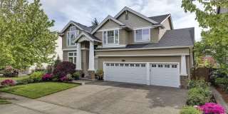 Spacious 4 Bedroom Home with Gourmet Kitchen, 3-Car Garage, Flexible Living Spaces & Covered Backyard Deck Spacious 4 Bedroom Home with Gourmet Kitchen, 3-Car Garage, Flexible Living Spaces & Covered Backyard Deck Gallery 1