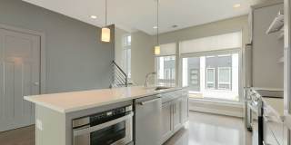Stunning South End end unit townhome in the modern and amazing Southpoint community. Gallery 15