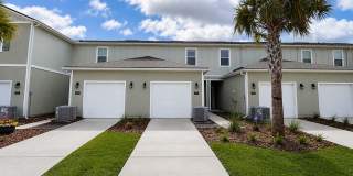 2BR/2.5BA Move-In Ready with Garage – Just Minutes from Oakleaf Town Center! Lawn Care Included! Gallery 1
