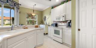 Experience Bell Tower Park. GATED ground floor 2 Bed 2 Bath Den 1 Car Garage Condo. Gallery 5