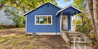 Charming 2-Bedroom Home with Original Hardwood Floors, Fenced Backyard & Abundant Storage Gallery 1