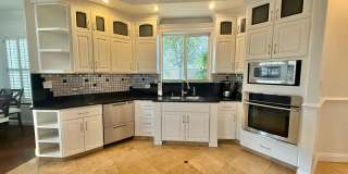 Partially Furnished 3 Bedroom / 2.5 Bathroom Custom Home in Sandhill Estates gated community! Gallery 13