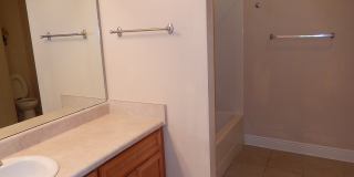 FABULOUS Newer NW 3/2 w/ Garage, Screen Porch Vaulted Ceilings,  Black Appliances! $1750/month Avail April 15th! Gallery 1