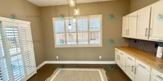 Open Kitchen, Expansive Living, and Covered Patio in Tranquil South Reno Near Trails, Parks & Shopping Gallery 13