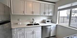 Updated 2-Bedroom Condo with Water Views, 2 Parking Spaces & Poolside Location Gallery 5