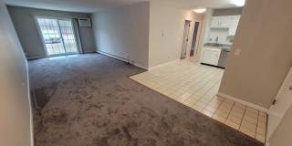 Adorable 1st Floor Condo 2 Bed / 1 Bath in South Manchester with Heat, Hot Watee, and 2 Car Parking Included! - $1,895/mo Gallery 1