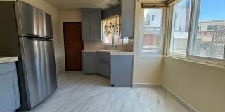 Cozy Two Bedroom Duplex w/ Hardwood Floors! Lovely Kitchen! Lots of Natural Light! Gallery 9