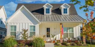 Beautiful newer cottage style home located in the middle of NWA. Gallery 1