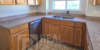 Spacious & Updated 2 Bedroom, 2 Bathroom Twin Home in Ammon with Garage, Fenced Backyard, and Hookups (Idaho Falls) for Rent by Real Property Management Gallery 22