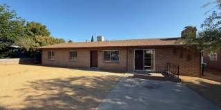 3 Bed plus Den/ 4th Bedroom 1 1/2 Bath Home with Fireplace Contact Property Pros Gallery 1