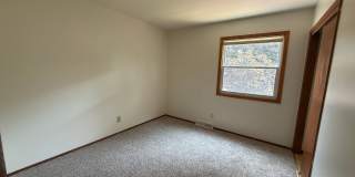 August 15th rent special! New deck! 3 Bedroom, updated kitchen, updated flooring, garage, driveway, and fenced yard - 9 month lease available! Gallery 37