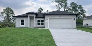 BRAND NEW CONSTRUCTION! GORGEOUS 4 BD/ 2BA HOME IN LEHIGH ACRES Gallery 1