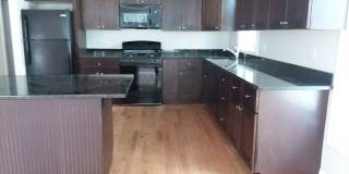 Renovated 3BR Duplex w/ Garage Parking  Laundry | Mission Hill | 9/1 Gallery 1