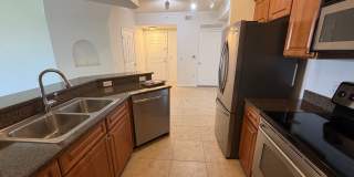 ANNUAL RENTAL - POSITANO PLACE-1 BED/1 BATH WITH LAKE VIEW AND NEW APPLIANCES! Gallery 1