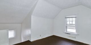 Charming 3BR Home with Classic Woodwork, Porch & Bonus Attic Space Gallery 15