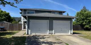 Charming 3 bedroom 1.5 bathroom Two story Town House with an attached garage. Gallery 1