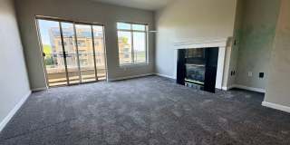 Top-Floor Corner 2BR with Lake Union Views + Garage Parking Included! Top-Floor Corner 2BR with Lake Union Views + Garage Parking Included! Gallery 1